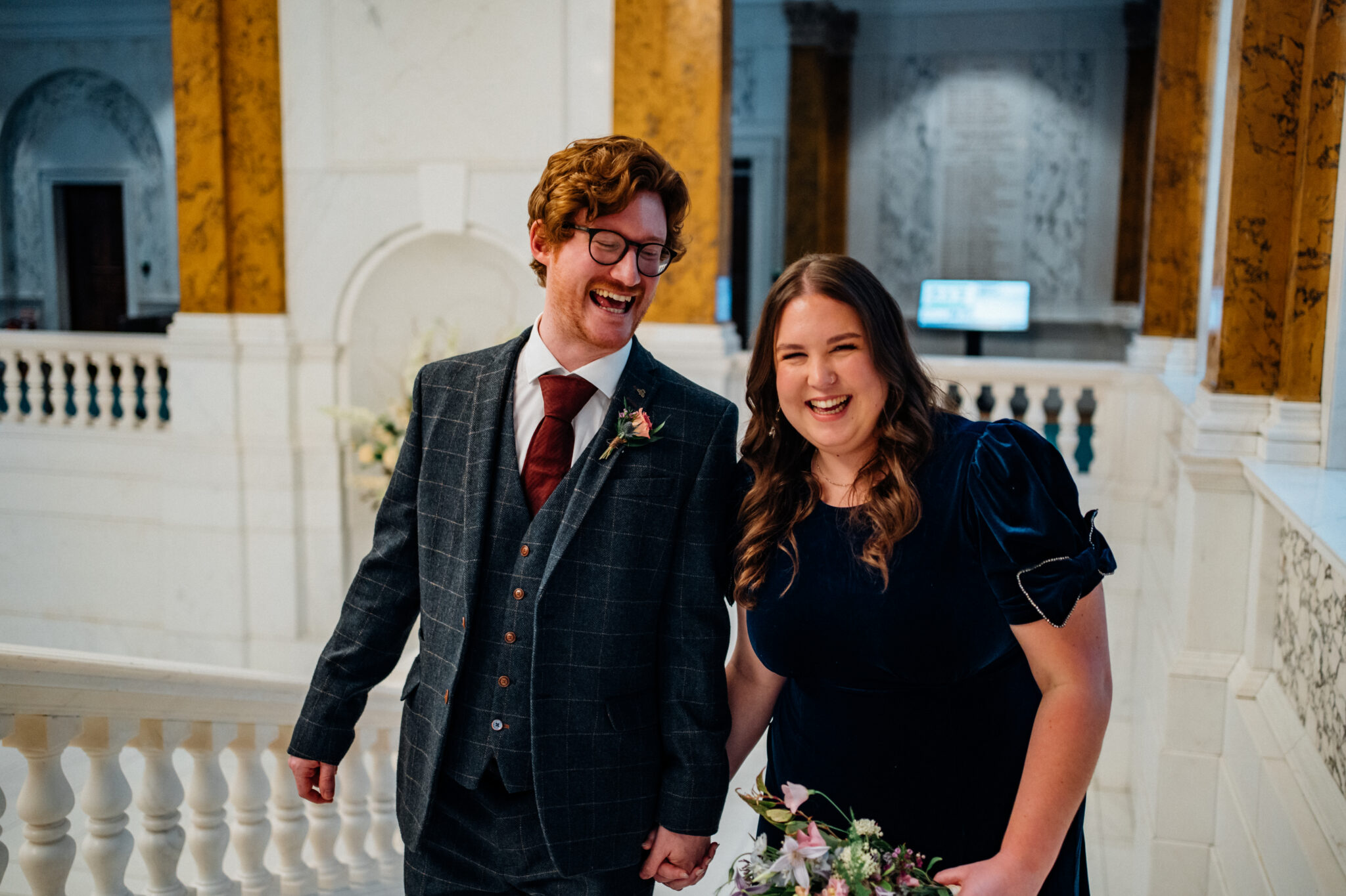 smiling couple in camden town hall